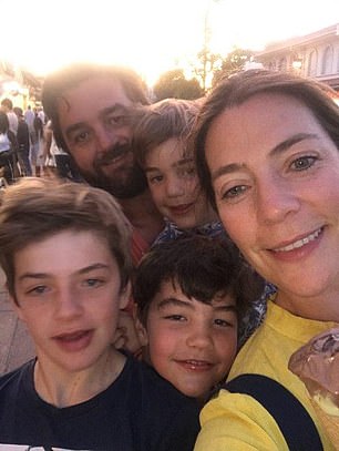 Founders Jason and Emma Ash pose on holiday with their young sons who helped inspire a business based on the free exchange of goods and saving the planet